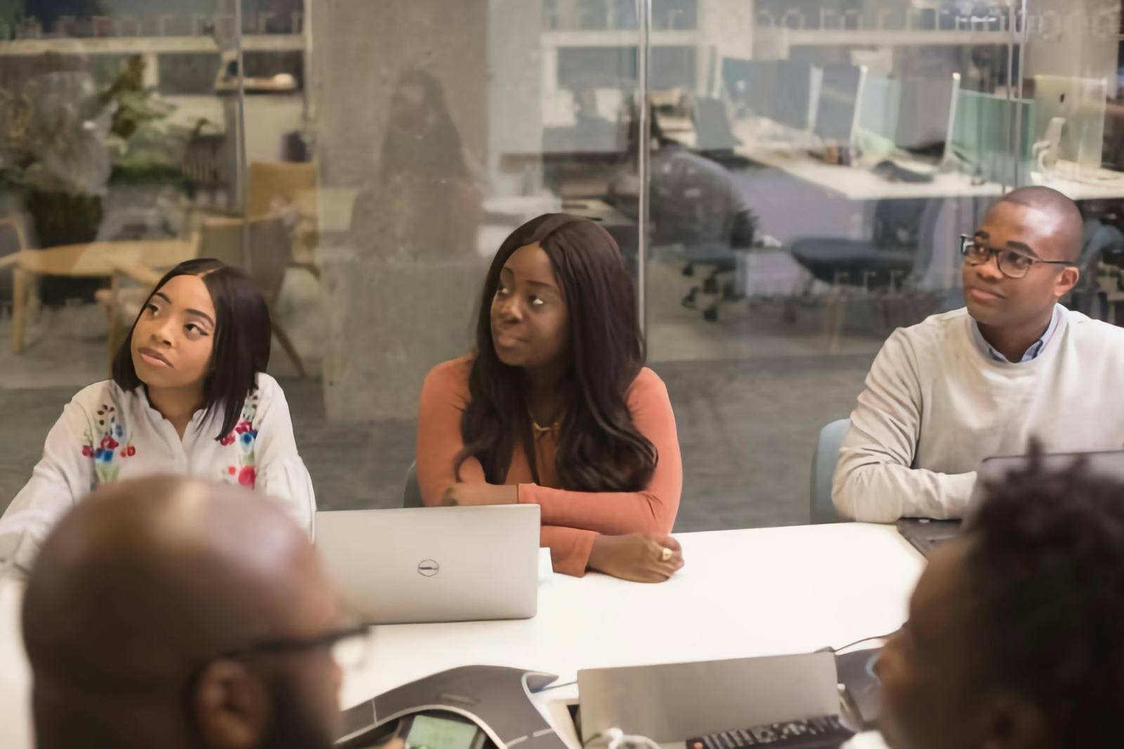 Colleagues talking during a team meeting