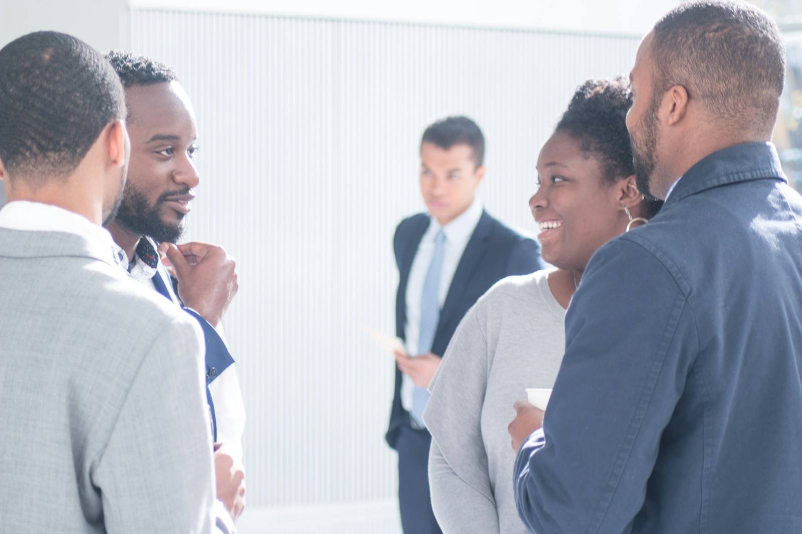 Professionals talking together in an office